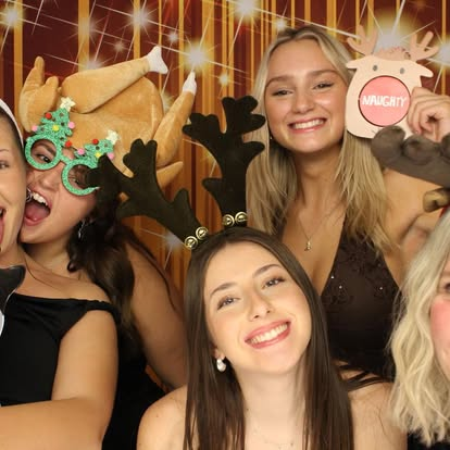 Guests using a photobooth